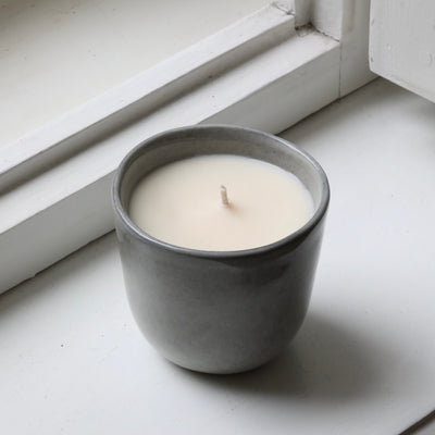 Scented candle in a cappuccino cup