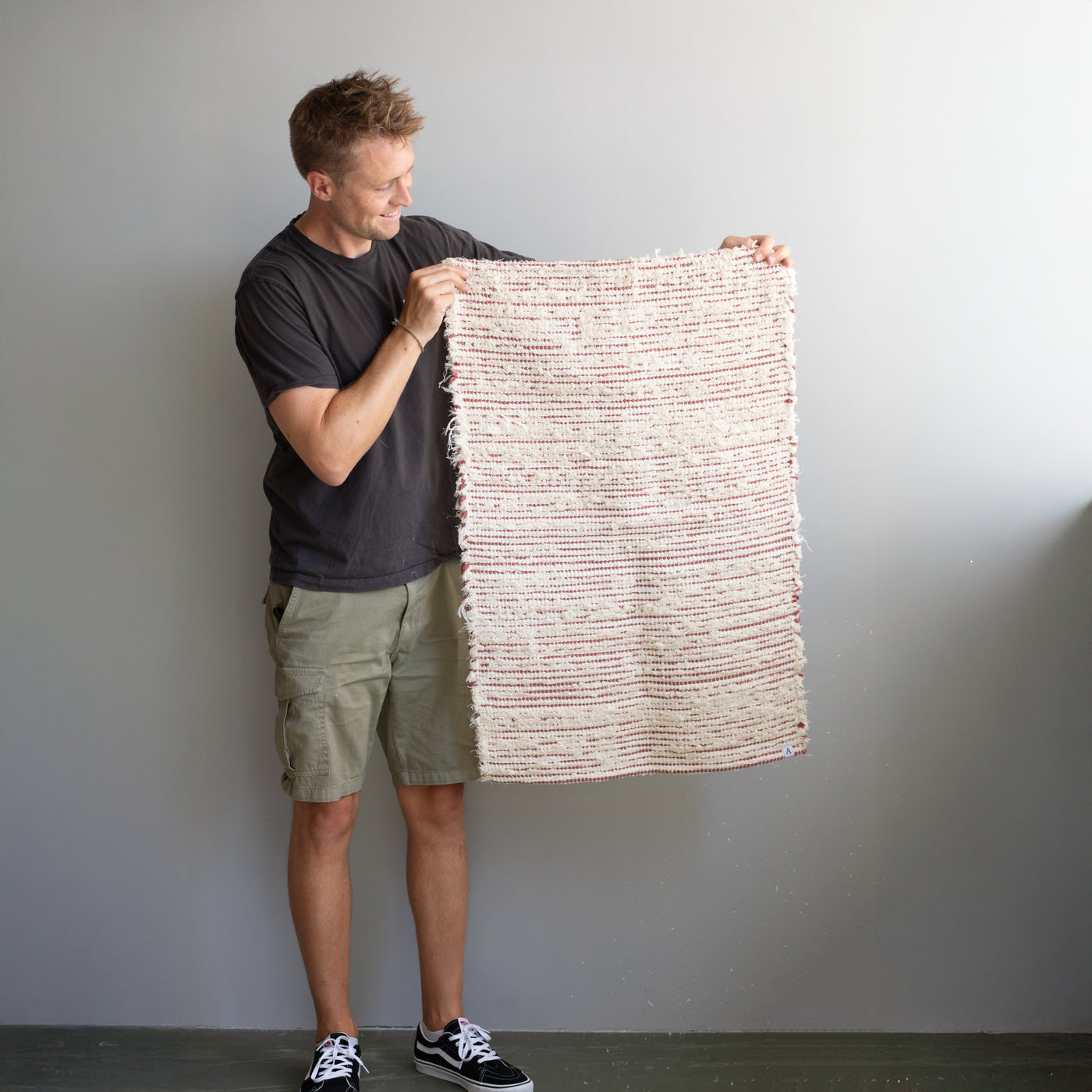 Hand-woven upright terry rug in white and peach striped made from recycled cotton fabric hand-woven in Portugal