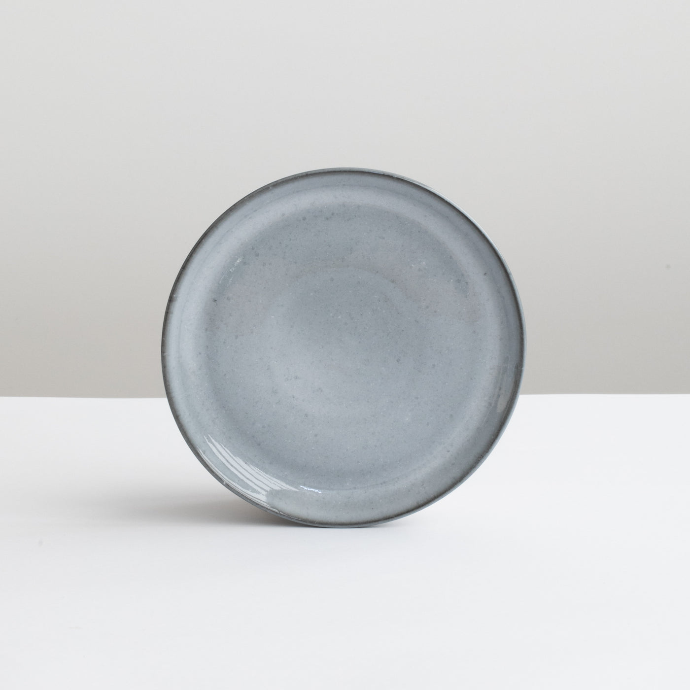 The small tapas plate is dark gray-blue like the stormy sea with a slightly thinner rim