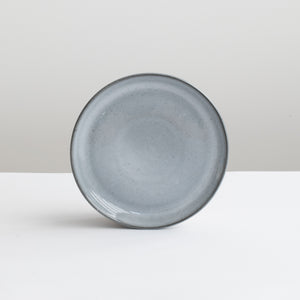 The small tapas plate is dark gray-blue like the stormy sea with a slightly thinner rim