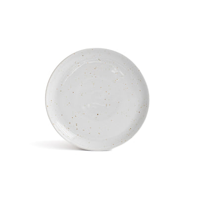 The shiny white tapas plate with golden speckles is the perfect size for bread, canapés or small starters