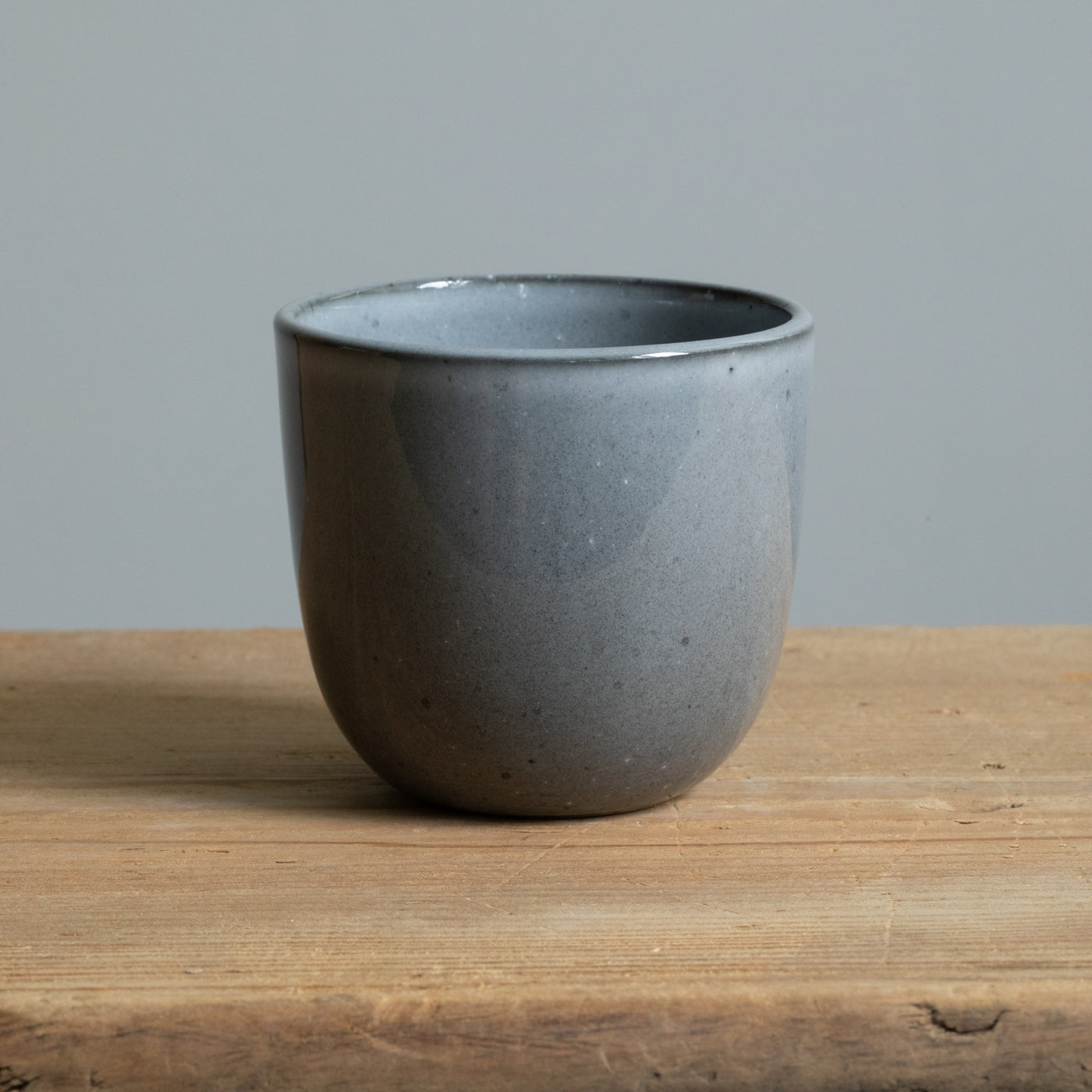 Dark gray stoneware coffee mug for cappuccino with glossy reactive glaze