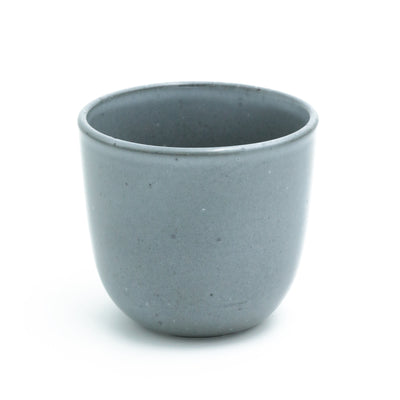 Dark gray coffee cup without handle cropped against a white background