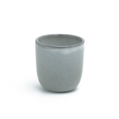Dark gray espresso mug without handle cropped against a white background