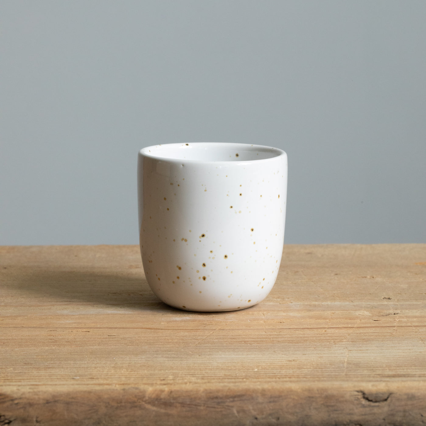 White espresso mug with golden brown dots without handle
