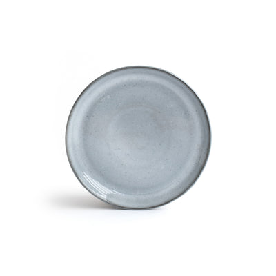Gray-blue small saucer with darker edge cropped against a white background