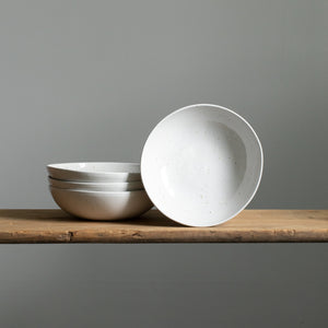 White pasta plate with fine golden dots made of stoneware