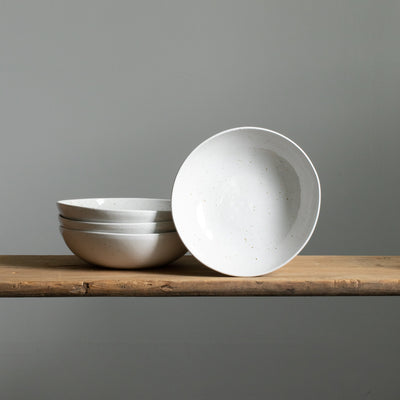 White pasta plate with fine golden dots made of stoneware
