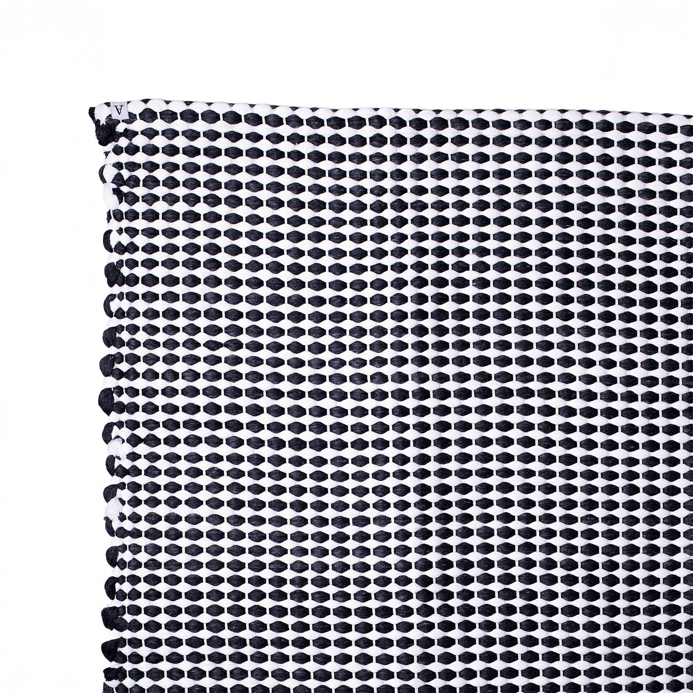 Large black and white carpet Detail of the black and white stripes handwoven