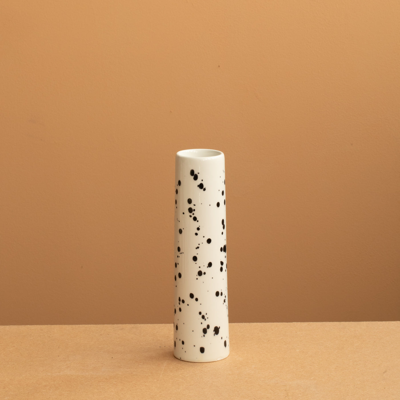 Small vase in cream color with black dots perfect for small flowers