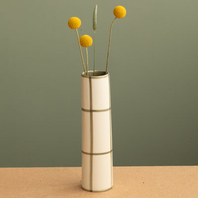 Small thin vase that looks like a fireplace checkered with olive green hand-painted stripes