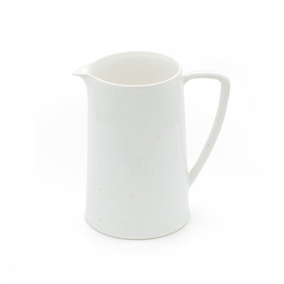 White jug with large fine handle cropped against a white background