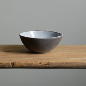 Breakfast bowl seen from the front in blue mottled color stackable bowl