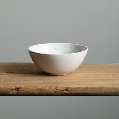 5cm deep breakfast bowl in white on a wooden table, seen from the front