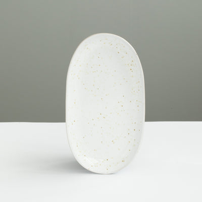 22 cm long oval plate perfect as a saucer or starter plate in white with golden brown spots
