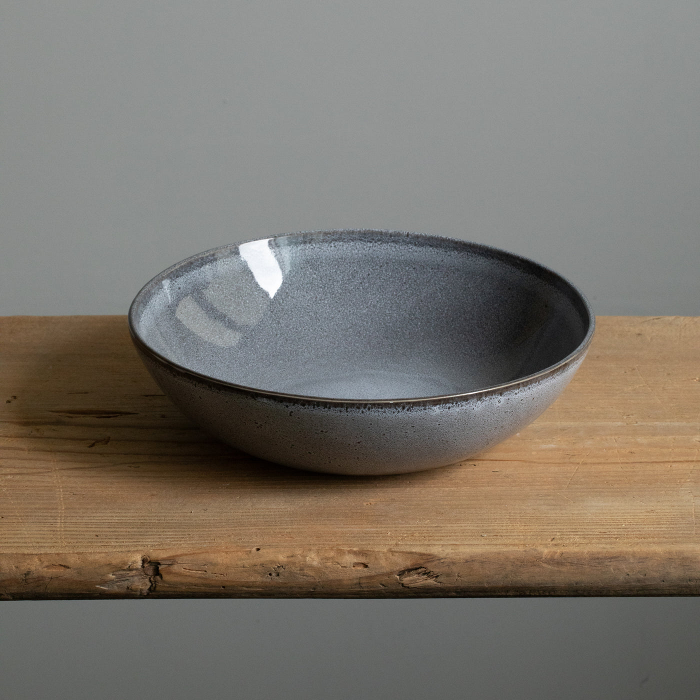 Blue mottled deep plate perfect for soups or pasta dishes photographed from above