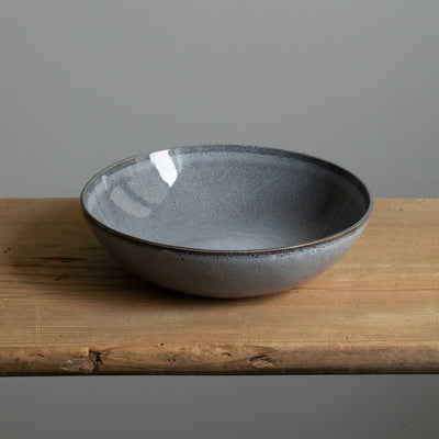 Blue mottled deep plate perfect for soups or pasta dishes photographed from above