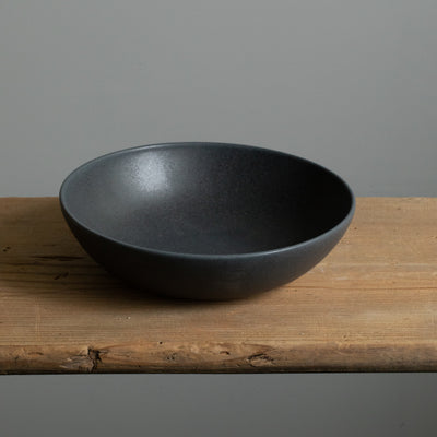 Matt black stoneware pasta plate seen from above 