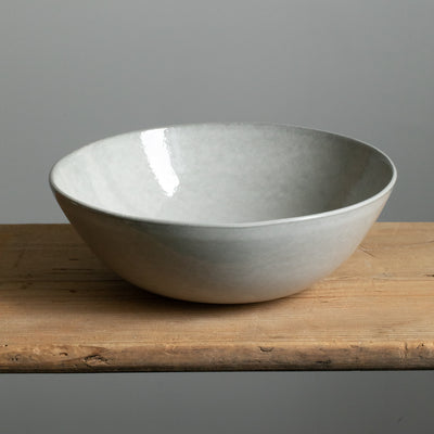 Large salad bowl in light gray made of stoneware produced in Portugal