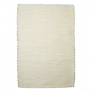 Striped two-tone bathroom rug with yellow and mint green stripes hand-woven in Portugal from cotton remnants