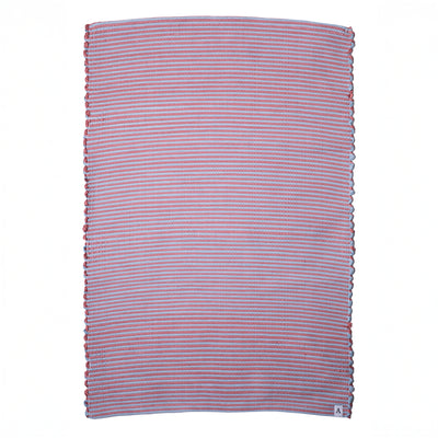Striped two-tone bathroom rug with red and blue stripes hand-woven in Portugal from cotton