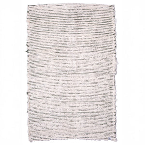 Striped two-tone bathroom rug made of white terrycloth with olive green stripes hand-woven in Portugal