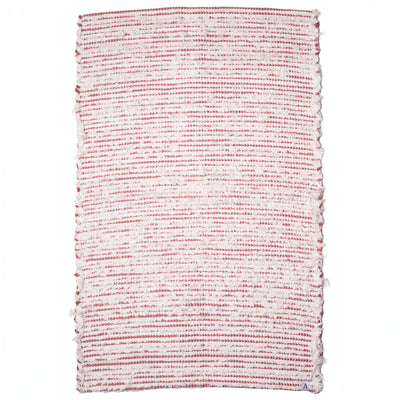 Striped two-tone bathroom rug made of white terrycloth with peach-colored stripes hand-woven in Portugal
