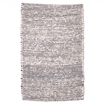 Striped two-tone bathroom rug made of white terrycloth with black stripes hand-woven in Portugal